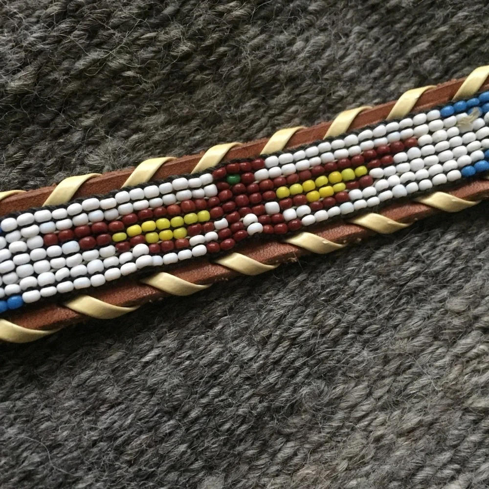 Vintage beaded belt size 26. Firebird design.